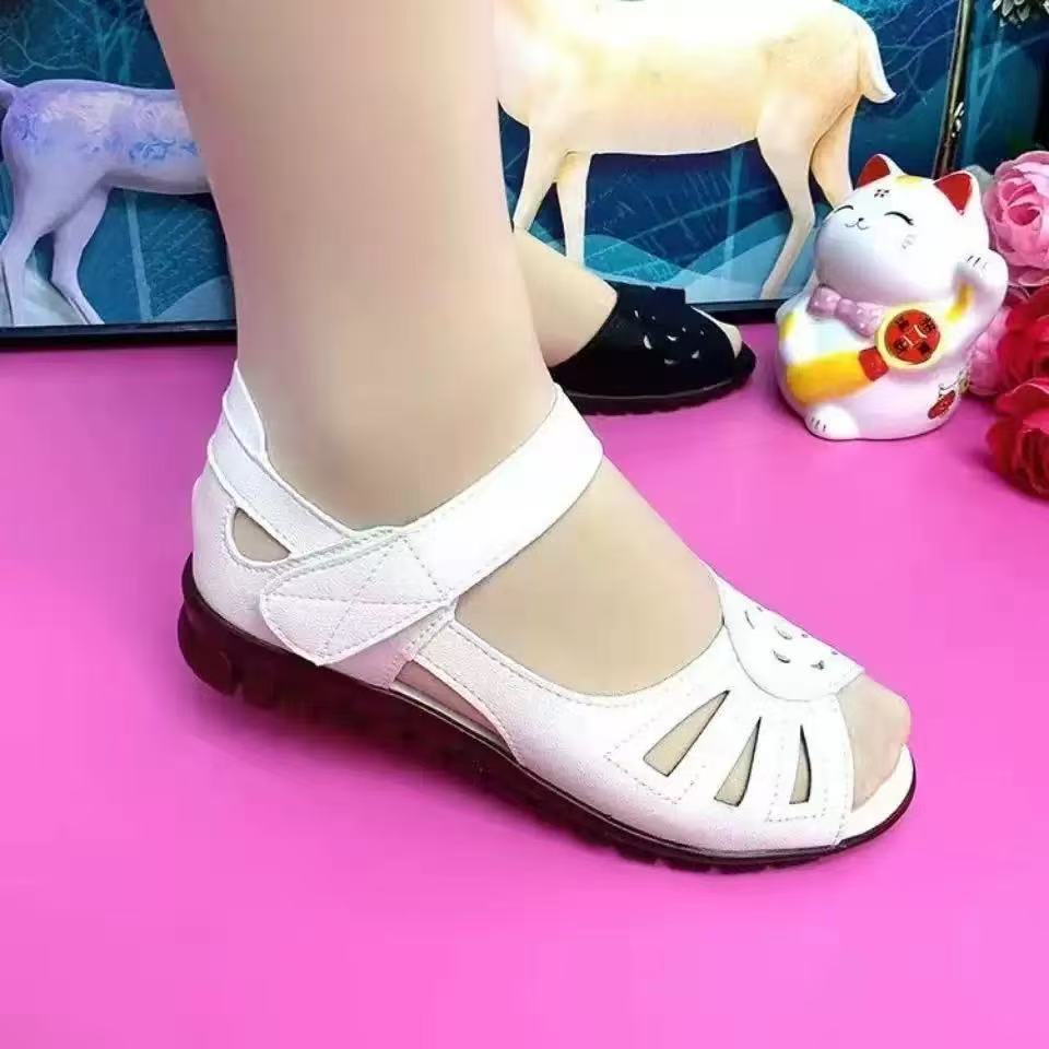 Sandalias planas de piel suave