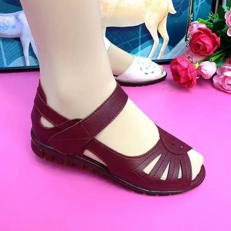 Sandalias planas de piel suave